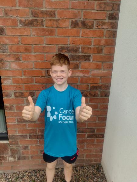 Caidhain and his mum Natalie are taking on the Moy Park Belfast City 5k Fun Run for Cancer Focus NI